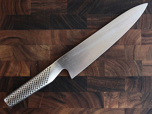 Global G-2 Chef's Knife on wooden cutting board
