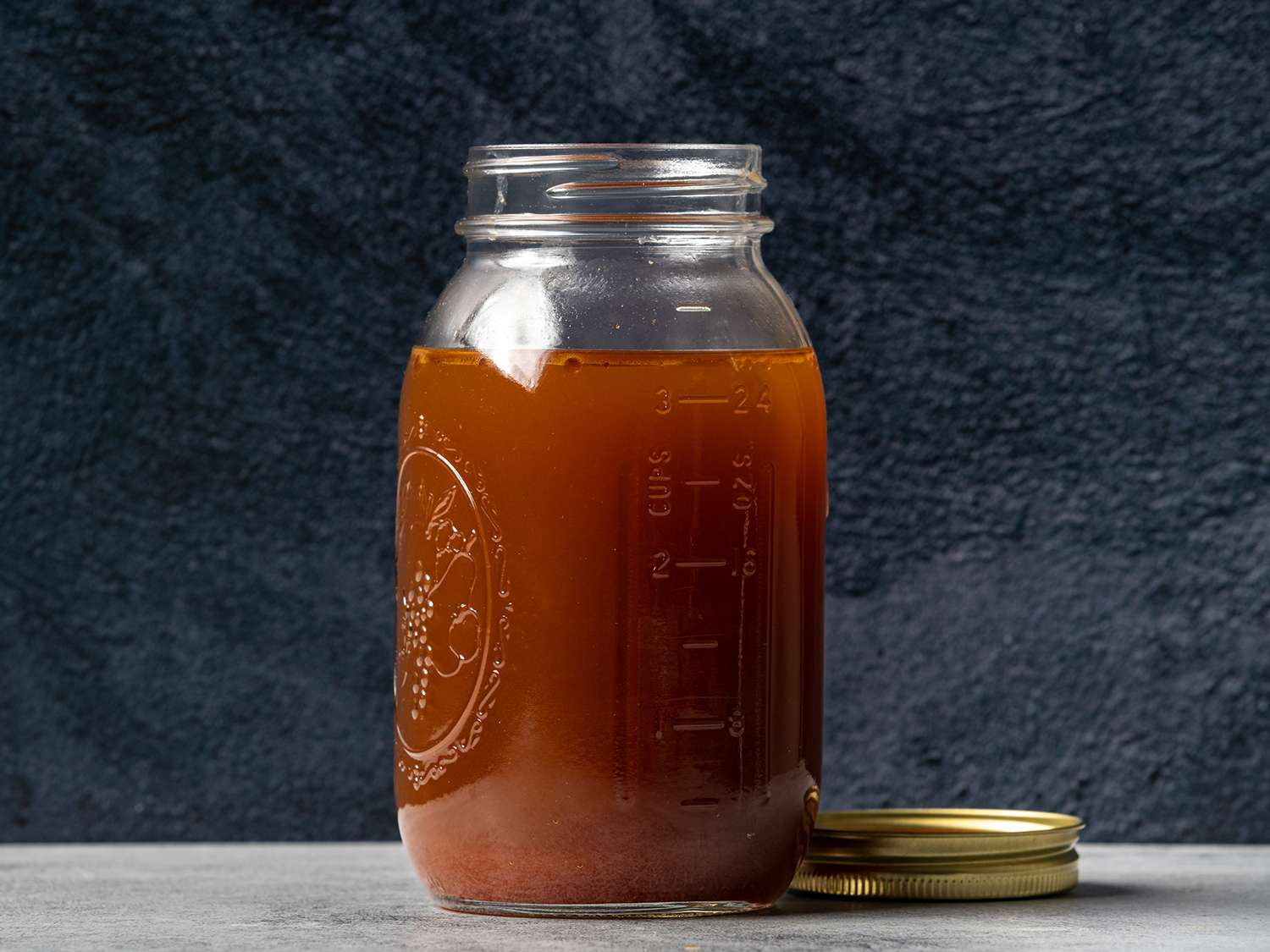 Pressure cooker beef stock in a jar
