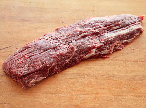 A raw ribeye cap, also called the spinalis, a beef cut. 