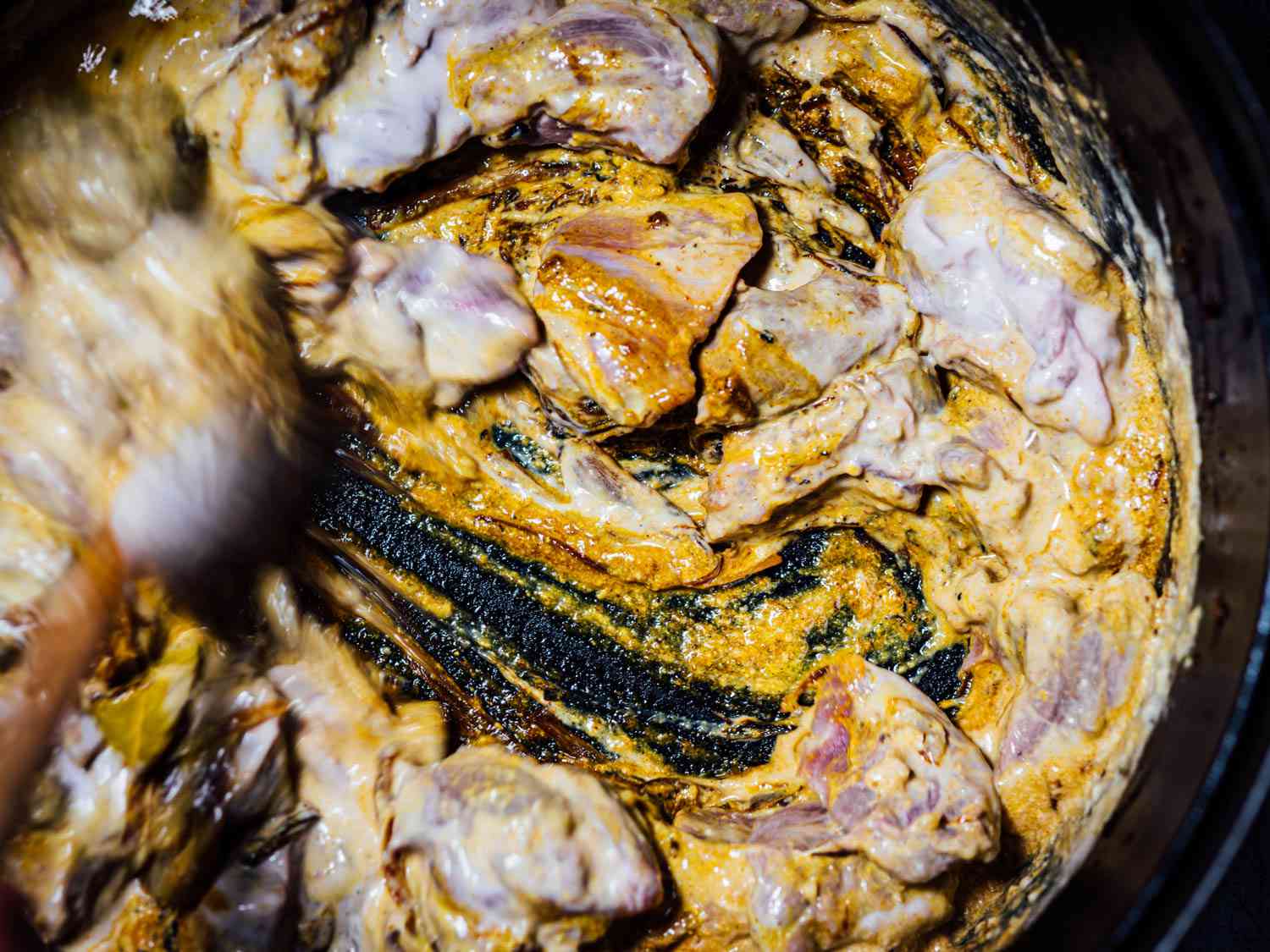 Marinated lamb in bottom of dutch oven