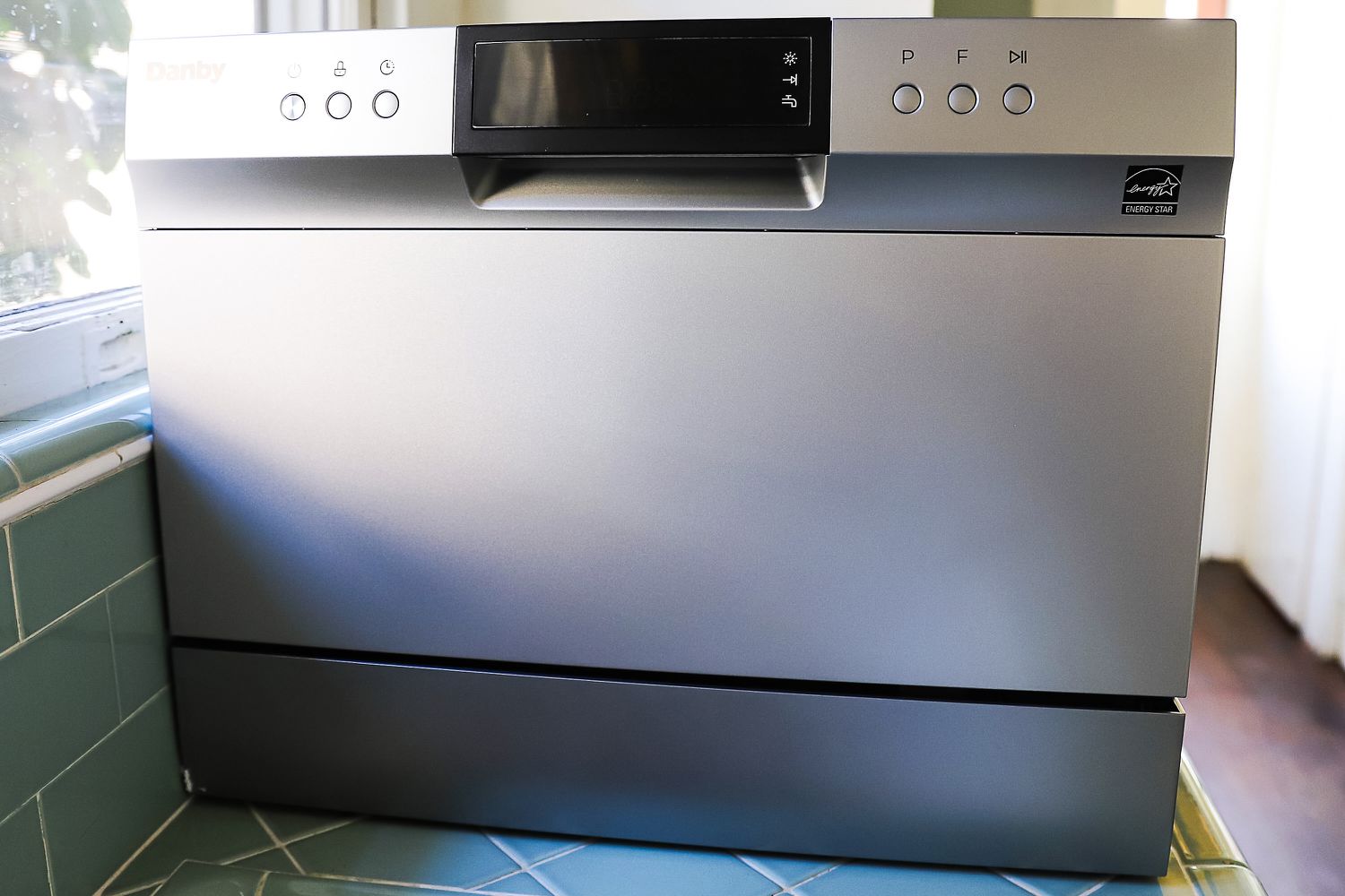 The Danby countertop dishwasher on a kitchen countertop.