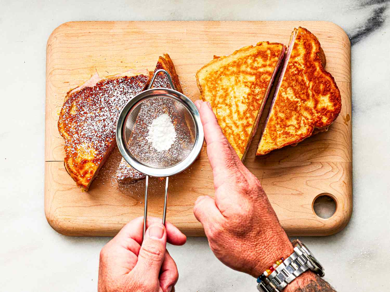 Overhead view of dusting with sugar