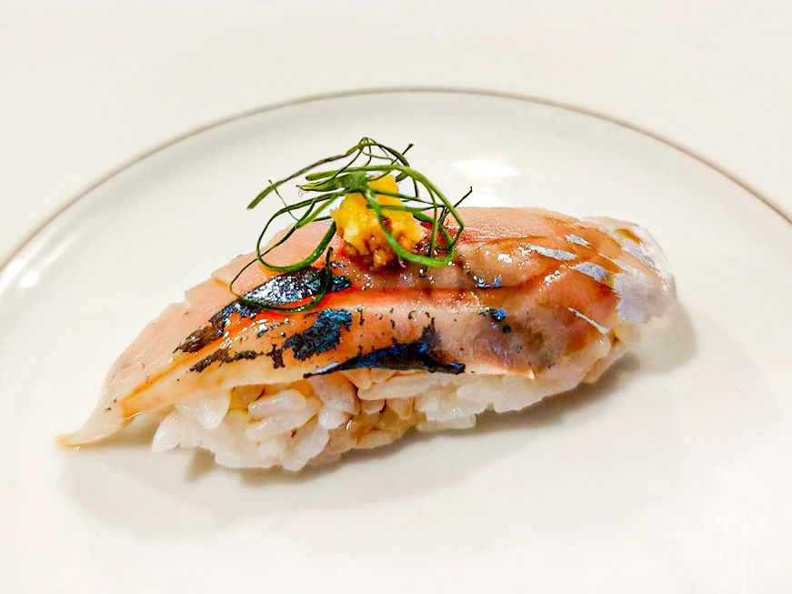 Side view of a piece of sushi