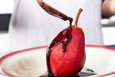 Glazing poached pear