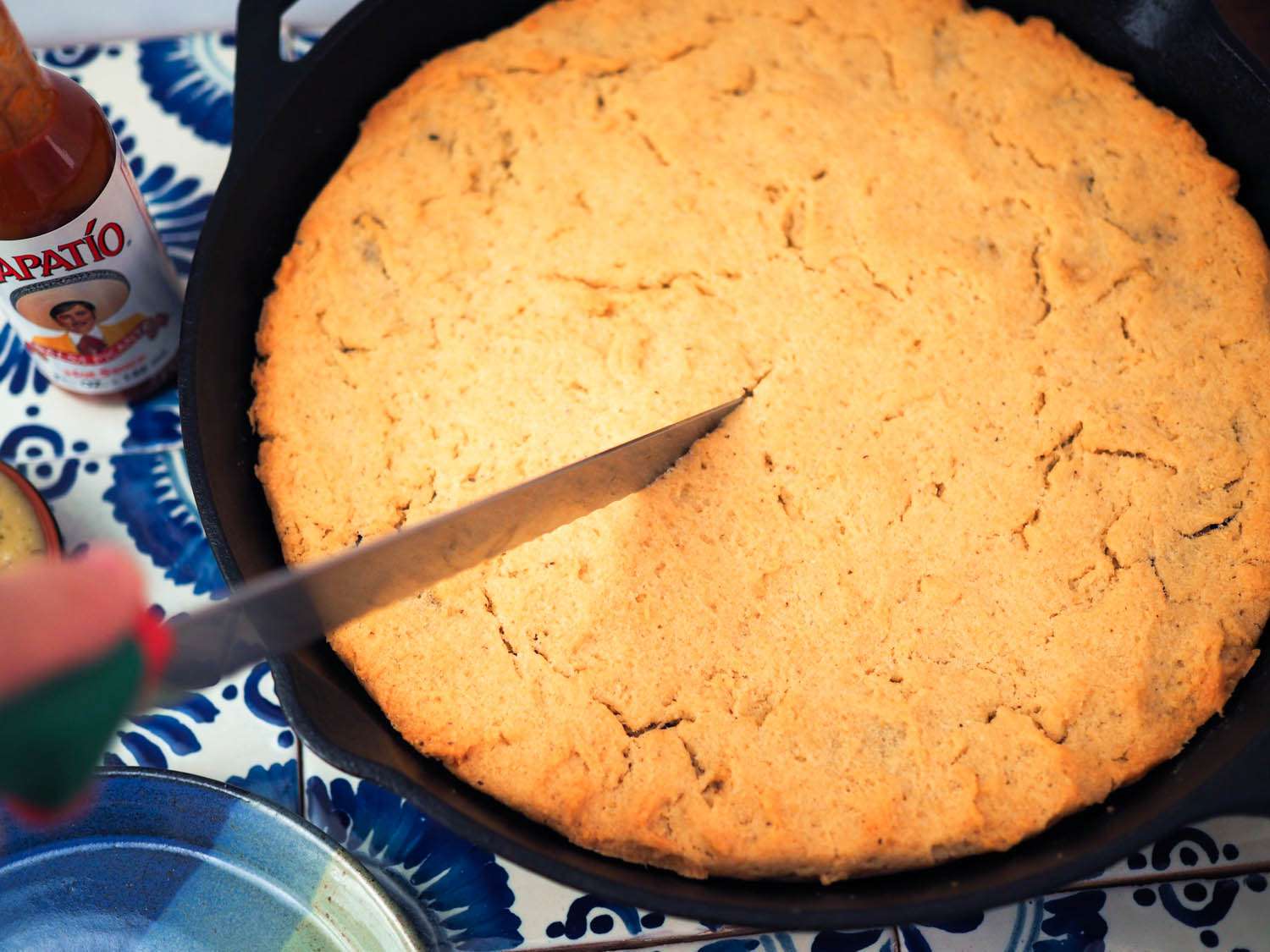 Author cutting in to the finished tamale pie.
