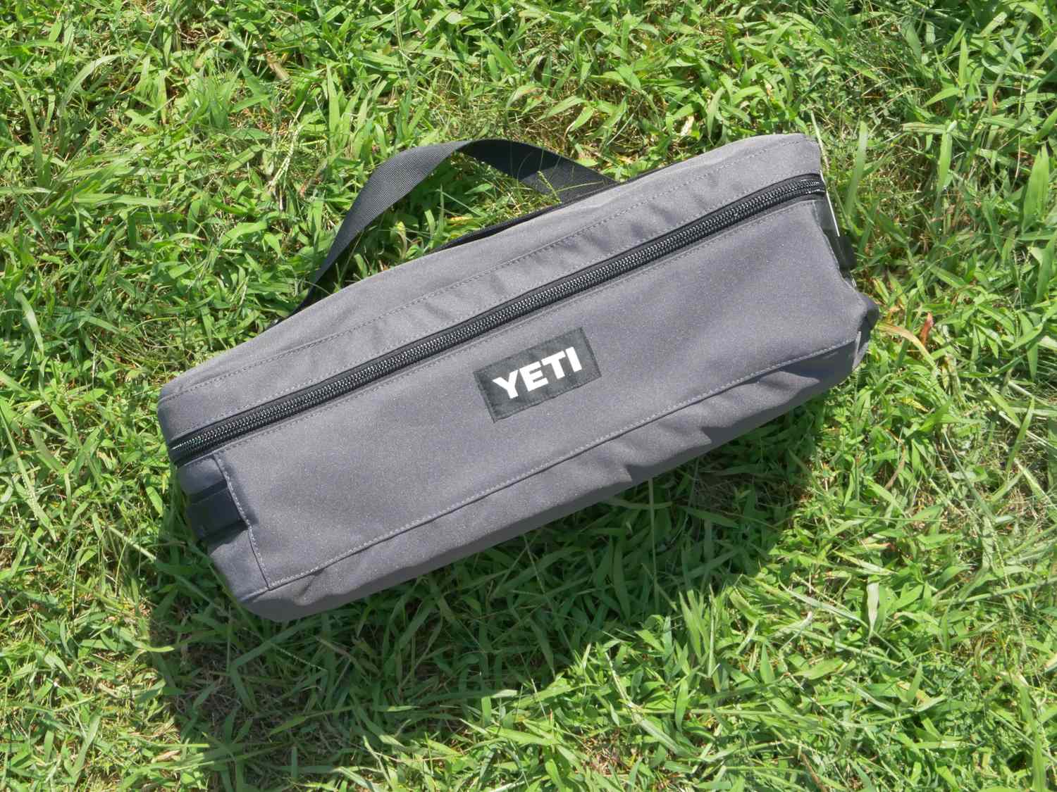 yeti blanket in bag on grass