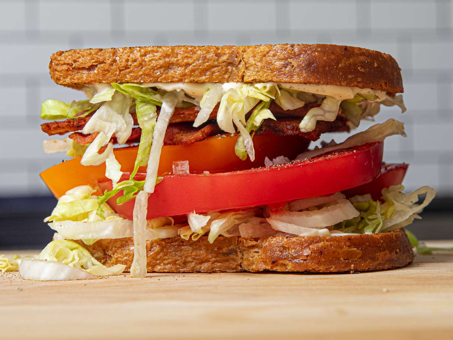 BLT sandwich from the side before being cut