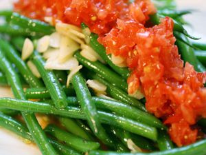 Closeup of Crisp Haricots Verts Salad with Fresh Tomatoes and Garlic.