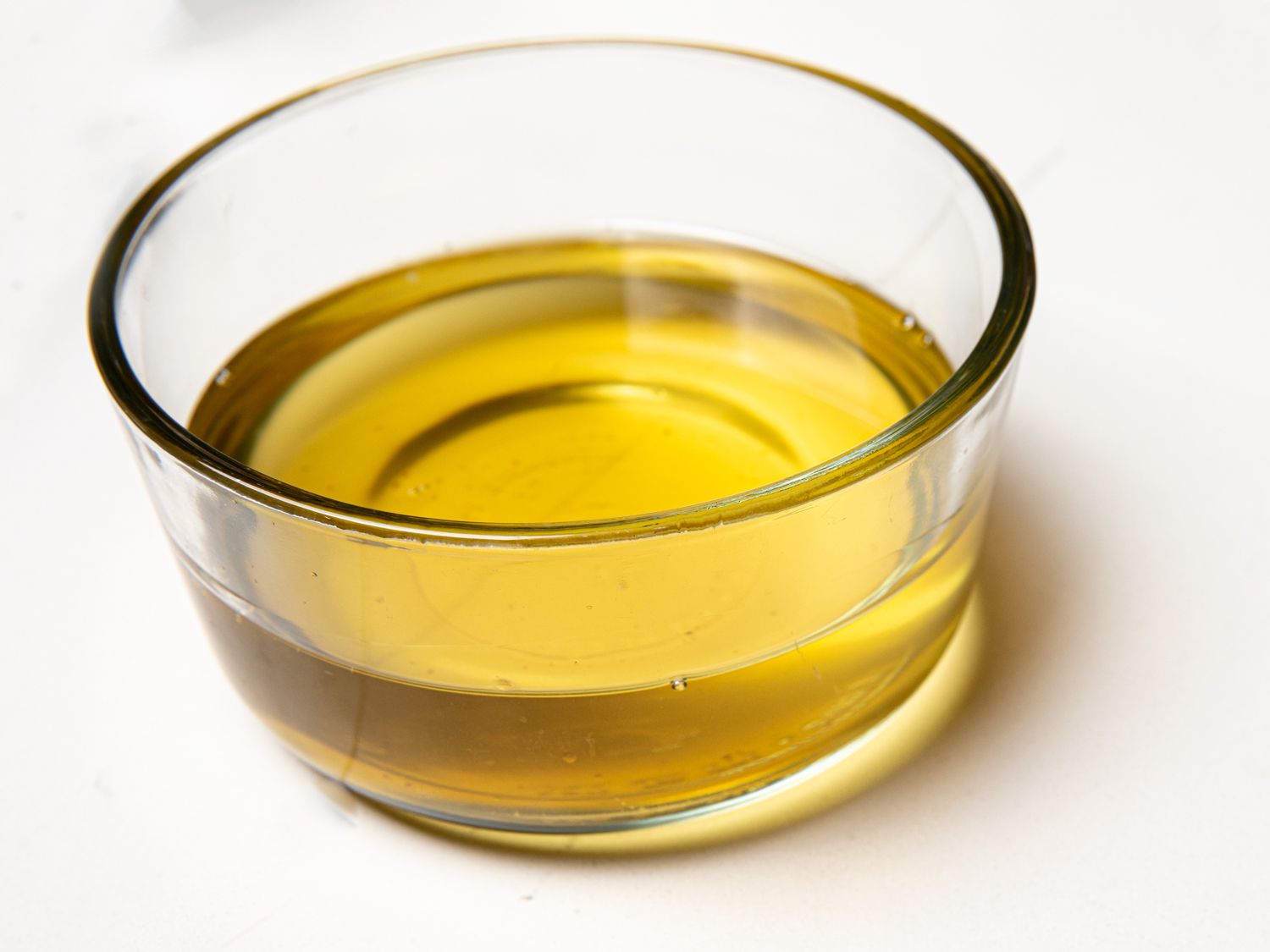 A glass bowl of infused oil