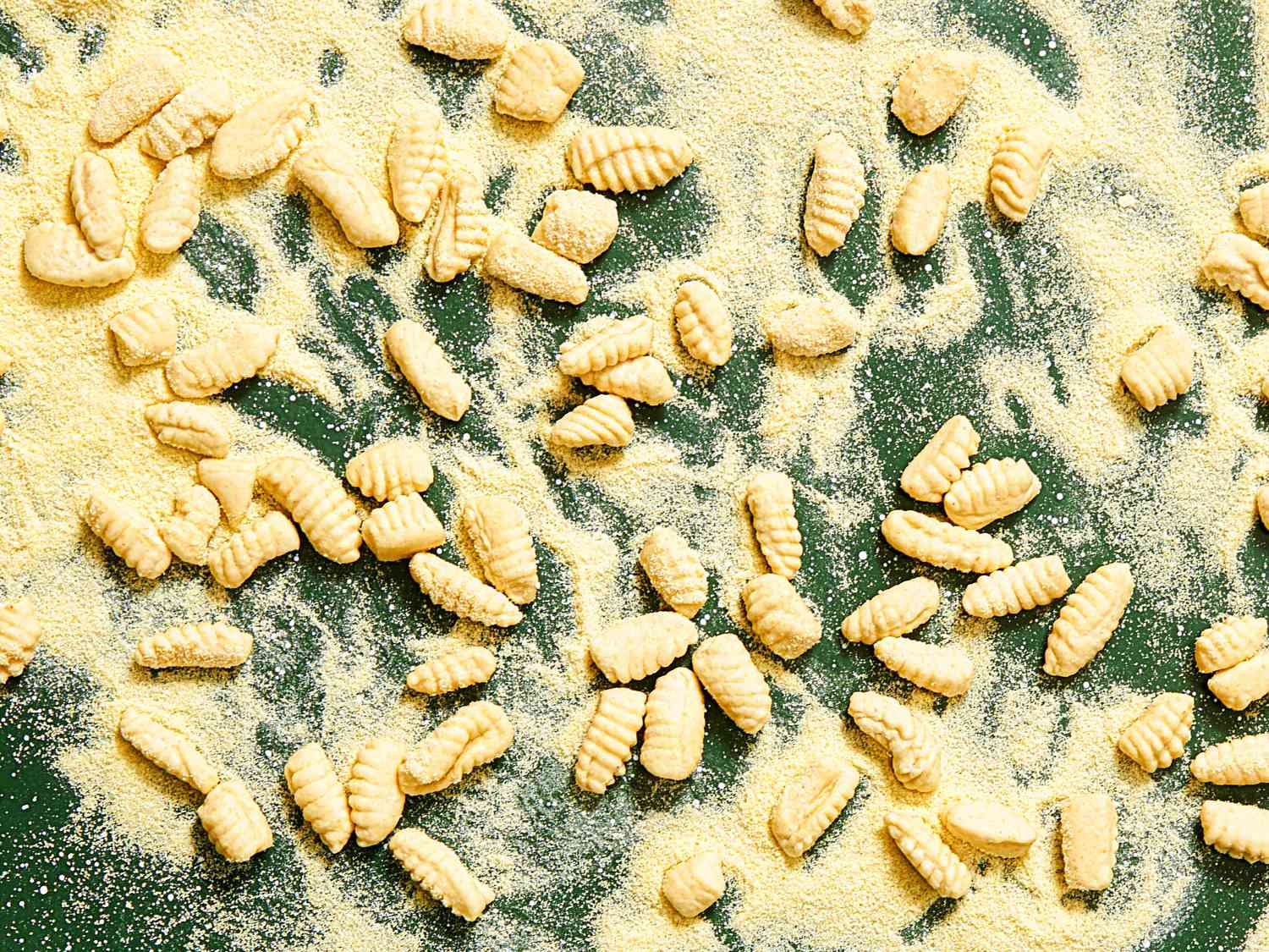 Overhead view of floured gnocchi 