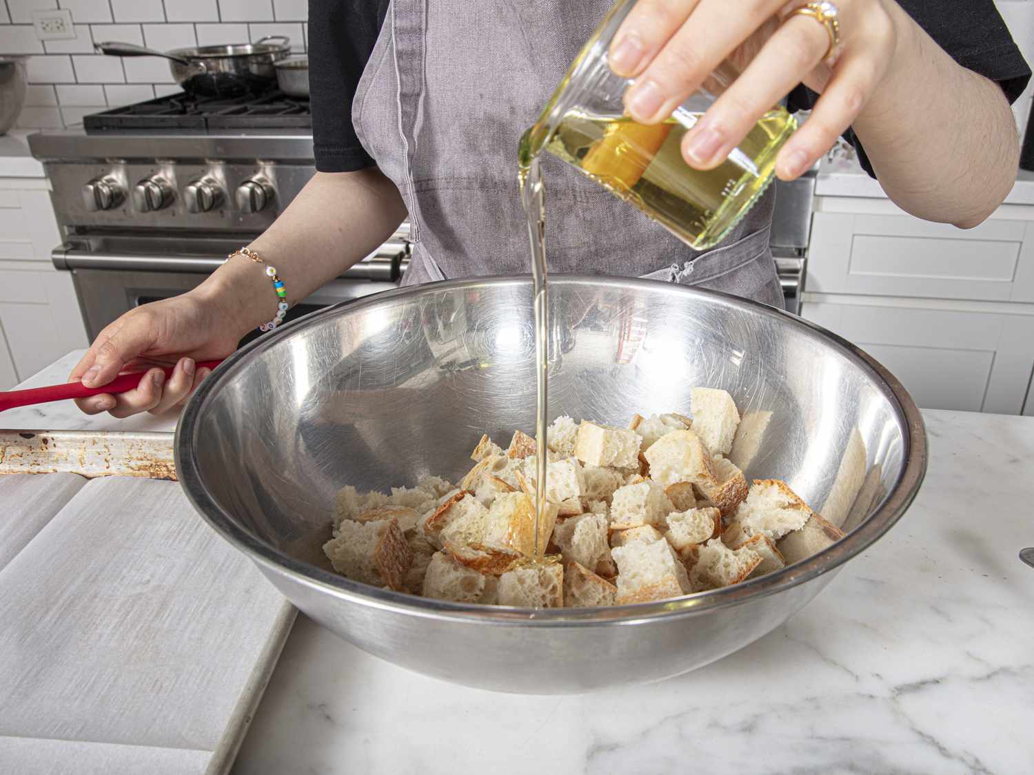 Side view of pouring oil