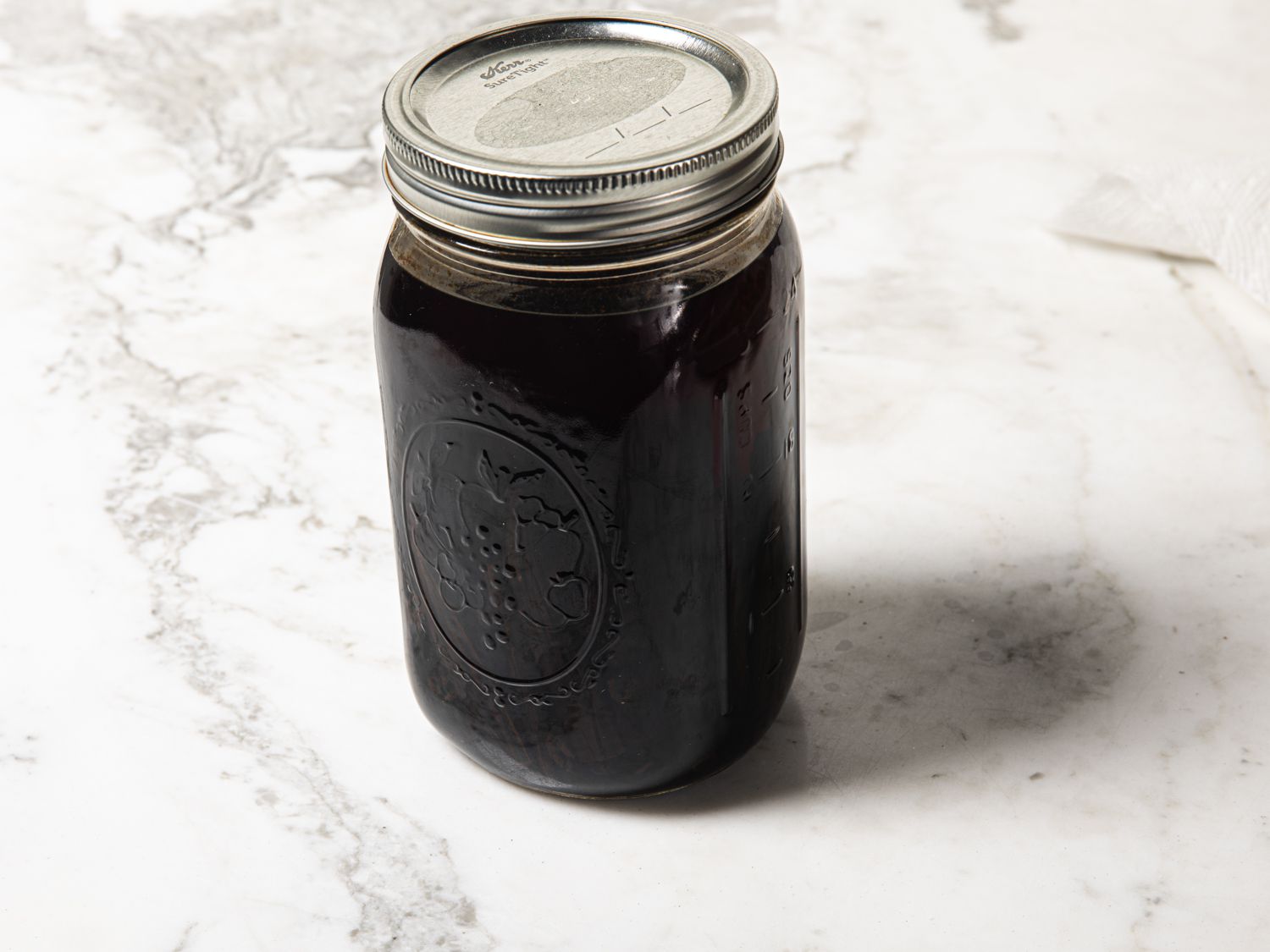 Overhead view of a jar of vanilla extract 