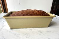 A side view of bread baked in the Williams Sonoma Goldtouch Pro Nonstick Loaf Pan