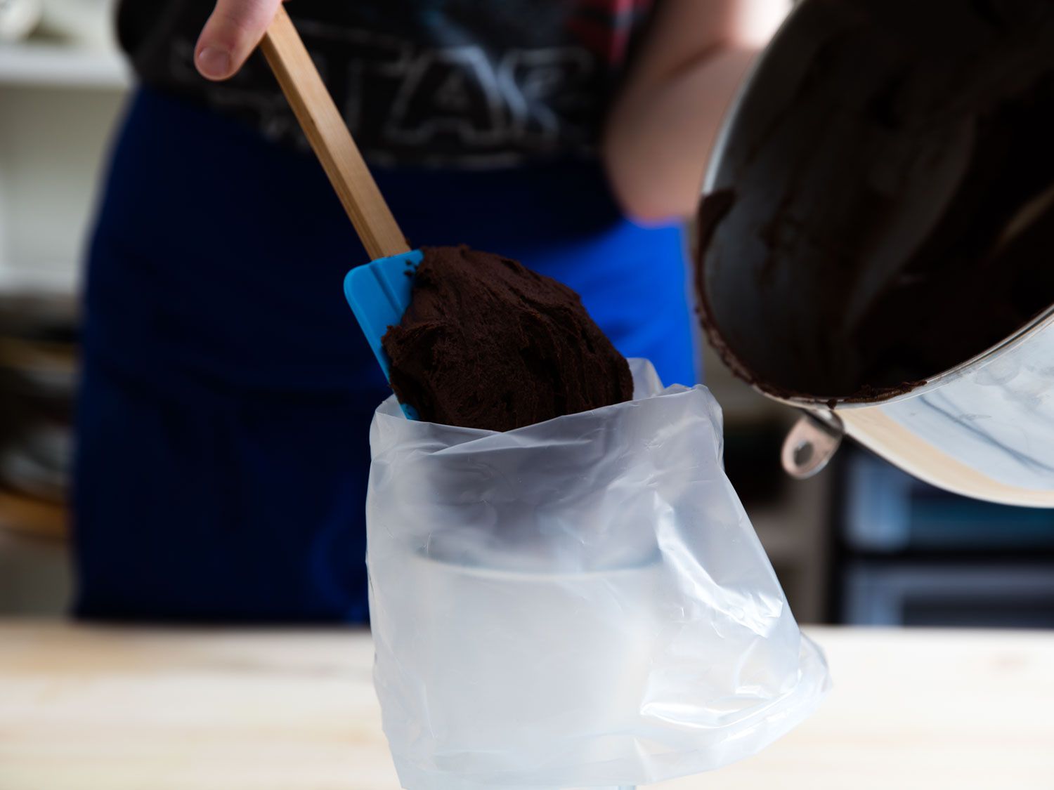 filling piping bag with chocolate devil dog batter