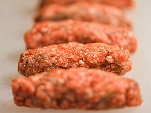 Close-up of formed cevapi sausages.