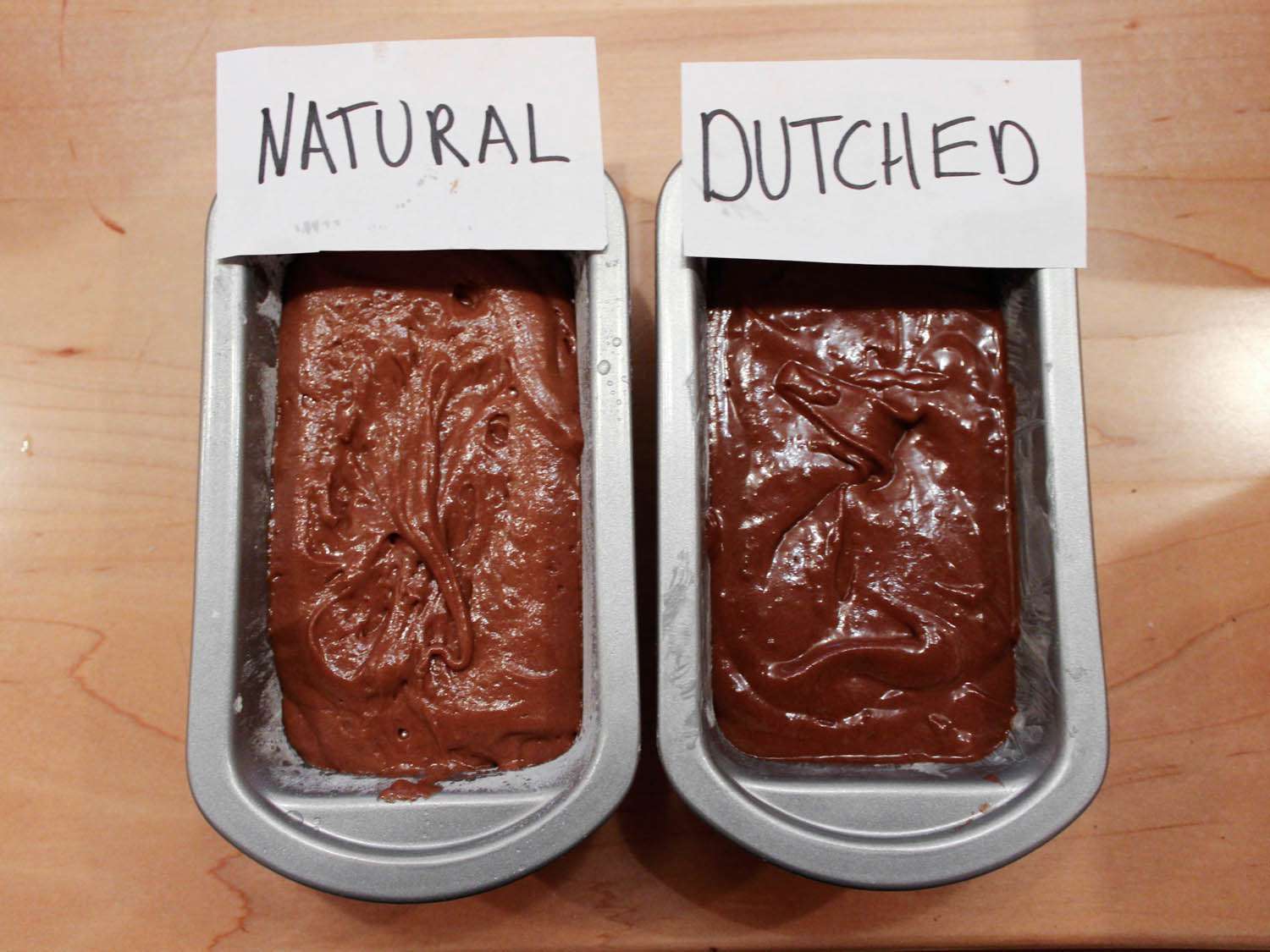 Side by side chocolate cake batters made with natural and dutched cocoa