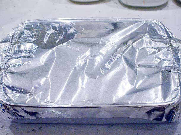 A foil covered baking dish