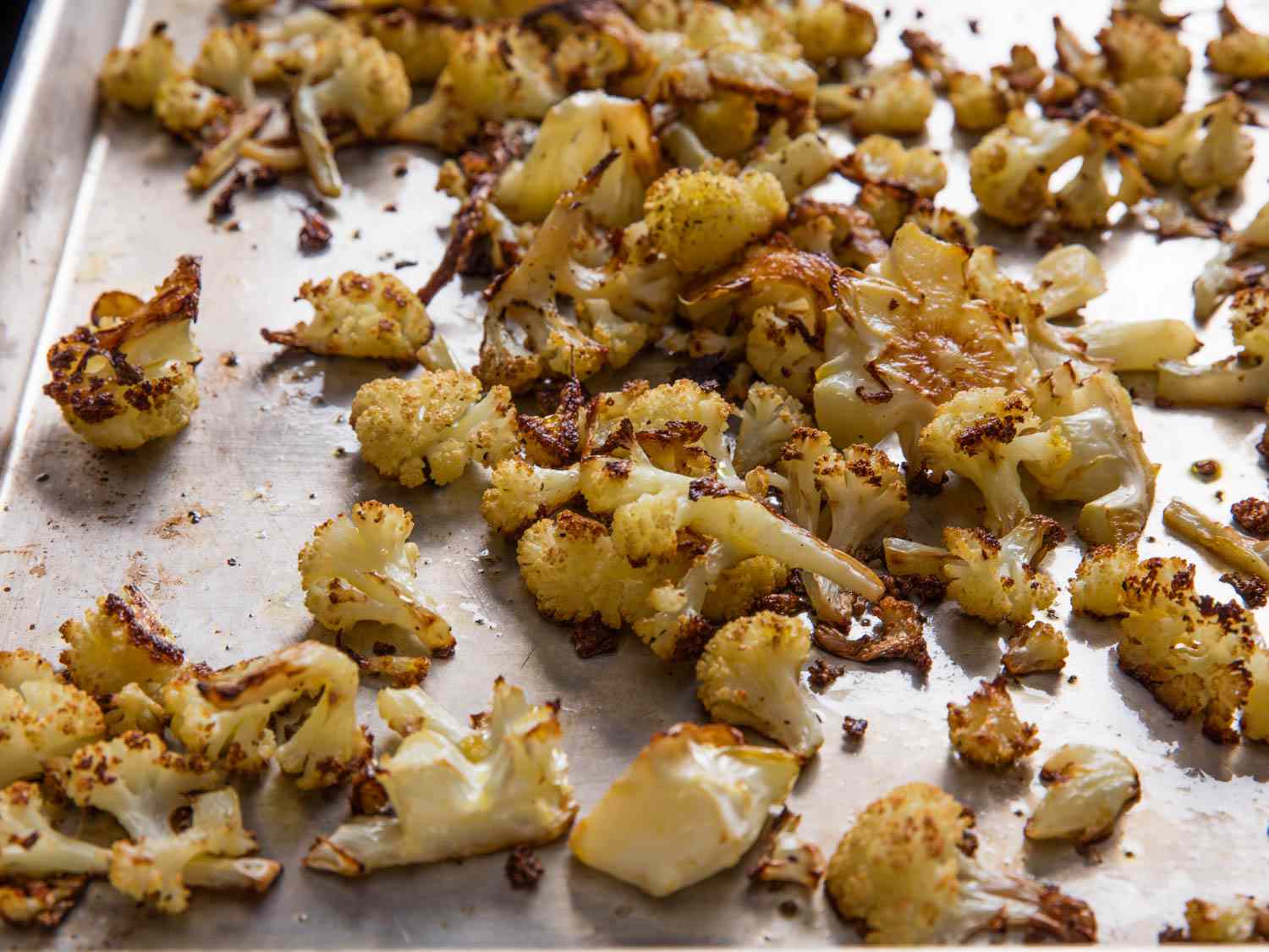 A sheet tray of roasted cauliflower.
