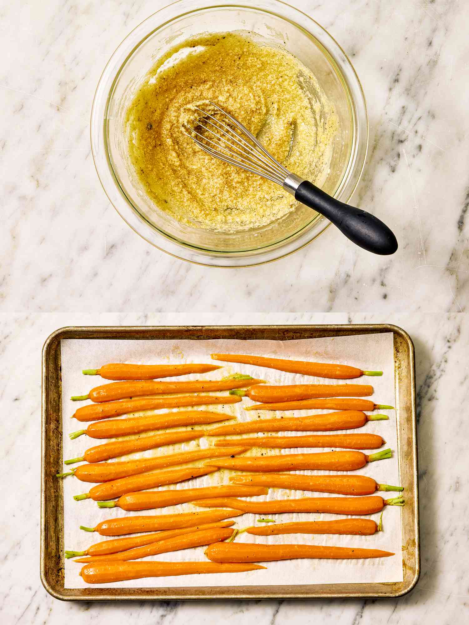 A preparation of spring carrots on a baking tray near a bowl with a whisk in seasoned mixture