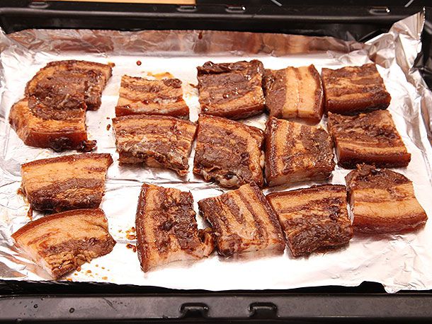 Chunks of sous vide pork belly ready to broil in the oven