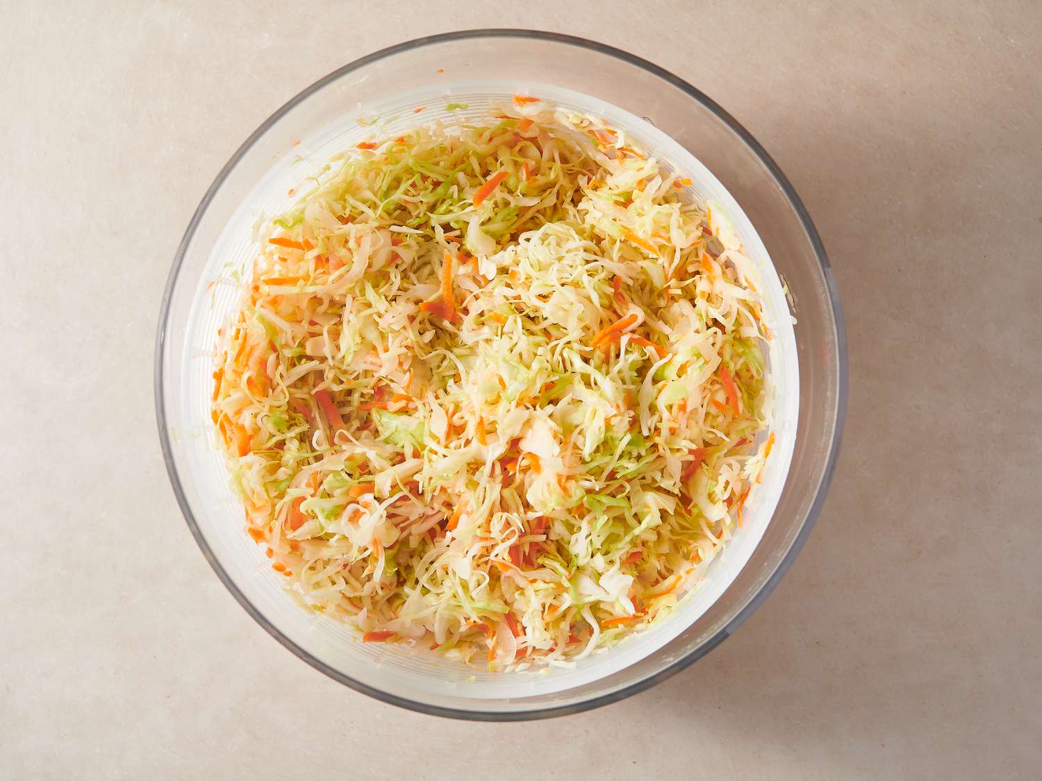 Vegetables spun dry inside salad spinner