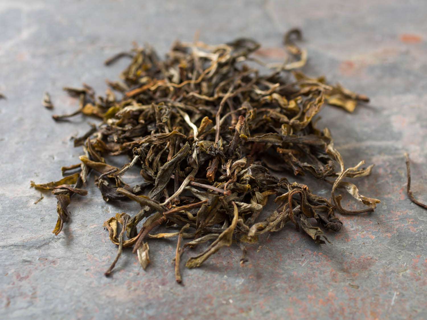 A pile of loose pu-erh tea leaves from Verdant Tea.