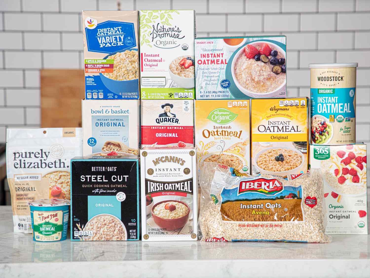 A selection of various instant oatmeal brands displayed on a counter