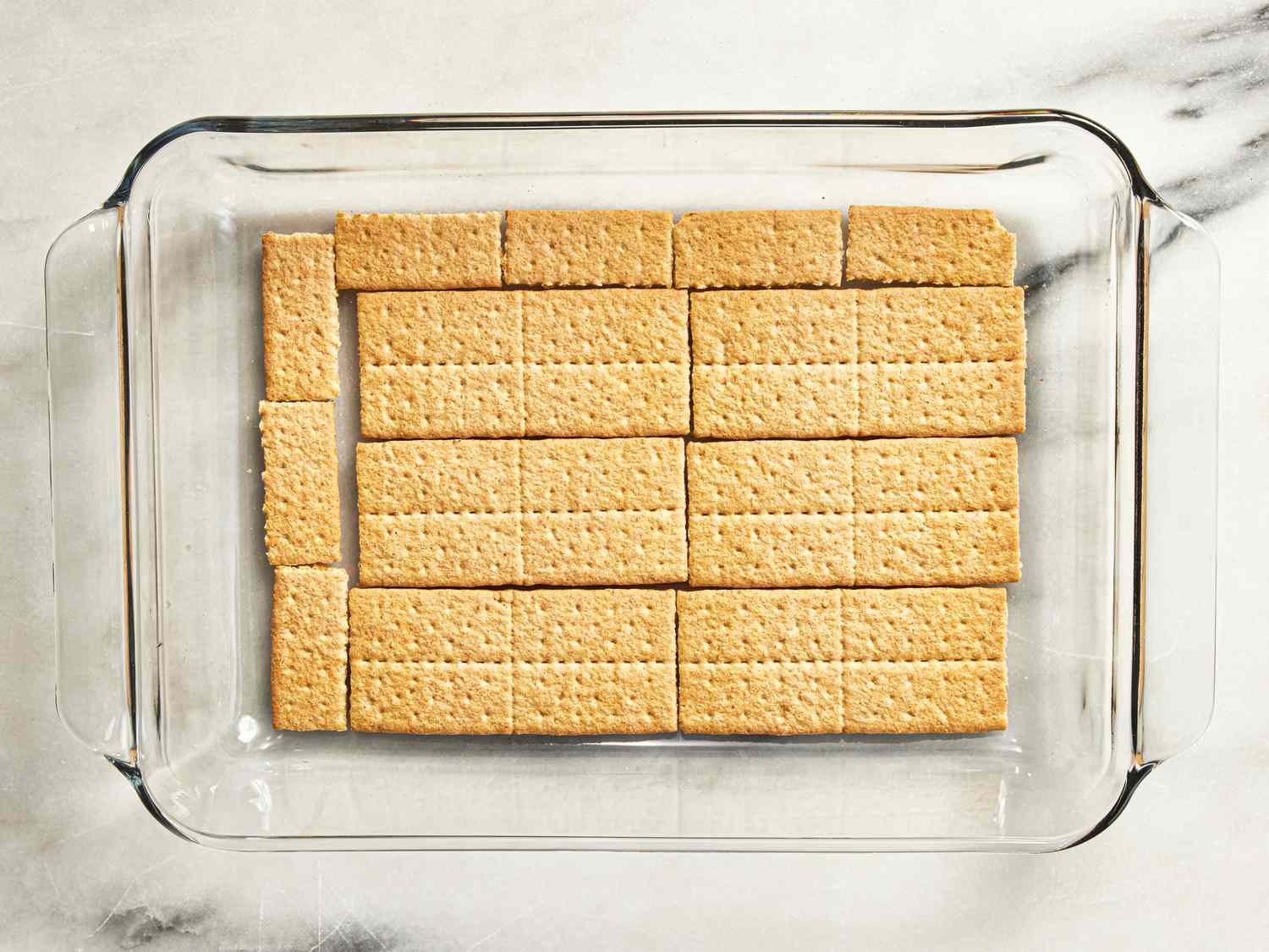 Overhead view of graham crackers in a baking dish
