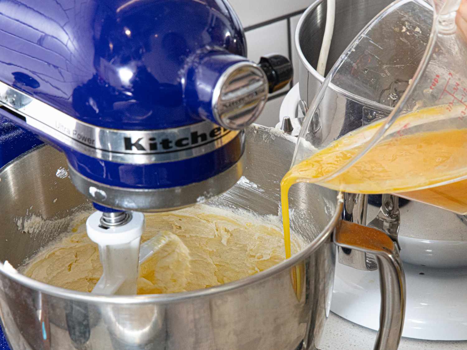 Side view of adding egg