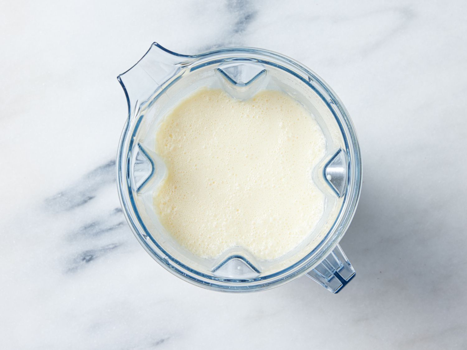 Overhead view of crepe batter in blender 