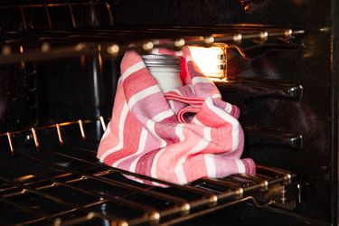 Wrapping your yogurt in a towel and setting it in a turned-off oven with the light on can help keep it just warm enough.