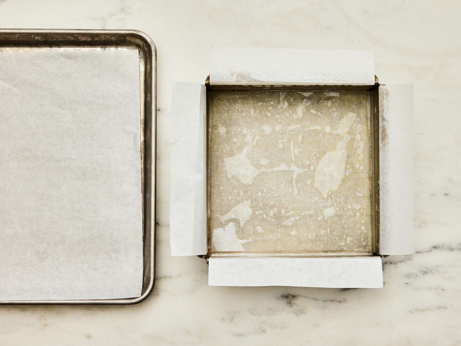 2 baking sheets, one large and one smaller, both lined with parchment paper 