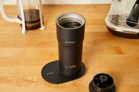 Ember Travel Mug 2 on table on table