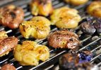 Smashed potatoes on the grill.