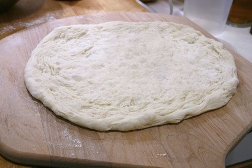 20100222-whole-foods-pizza-dough-stretched.jpg