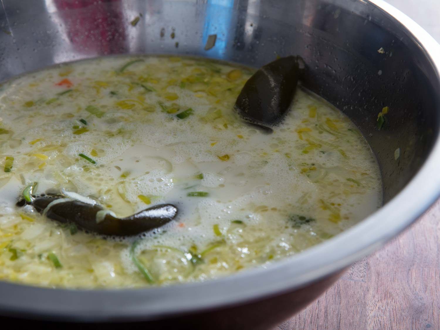 Vegetables and kombu steeping in chicken paitan broth