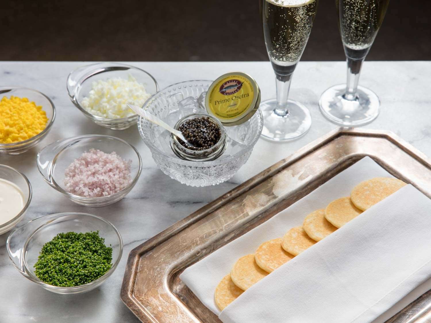 Full caviar service with yeasted blini