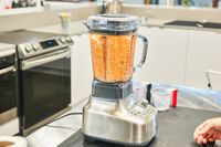 Fruit is blended in the Breville Stainless Steel Super Q Blender