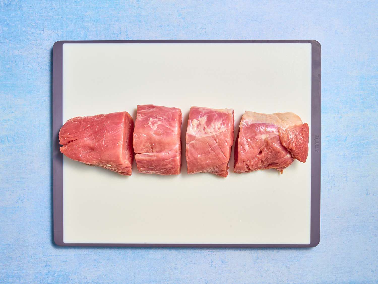 Overhead of cutting pork into 4