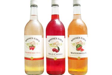 bottles of Boone's Farm Strawberry Hill, Wild Cherry, and Watermelon 