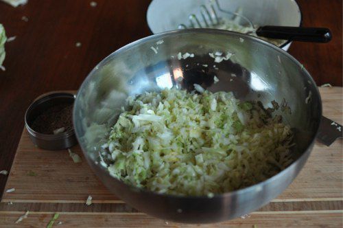 The pounded and seasoned cabbage, ready to be packed in a jar.