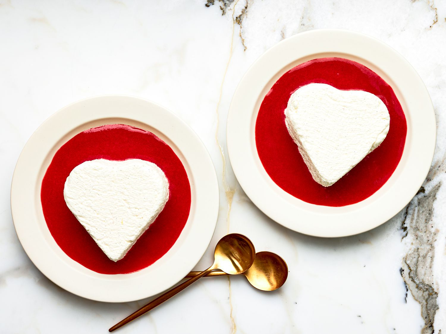 Overhead view of coeur al creme with strawberry sauce