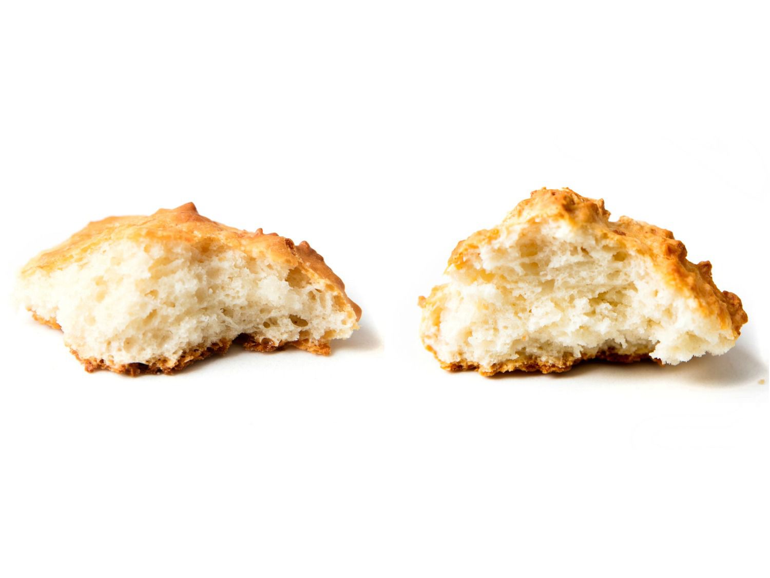 Broken-open biscuits made with buttermilk and reconstituted buttermilk powder: the one made with buttermilk is taller and fluffier.