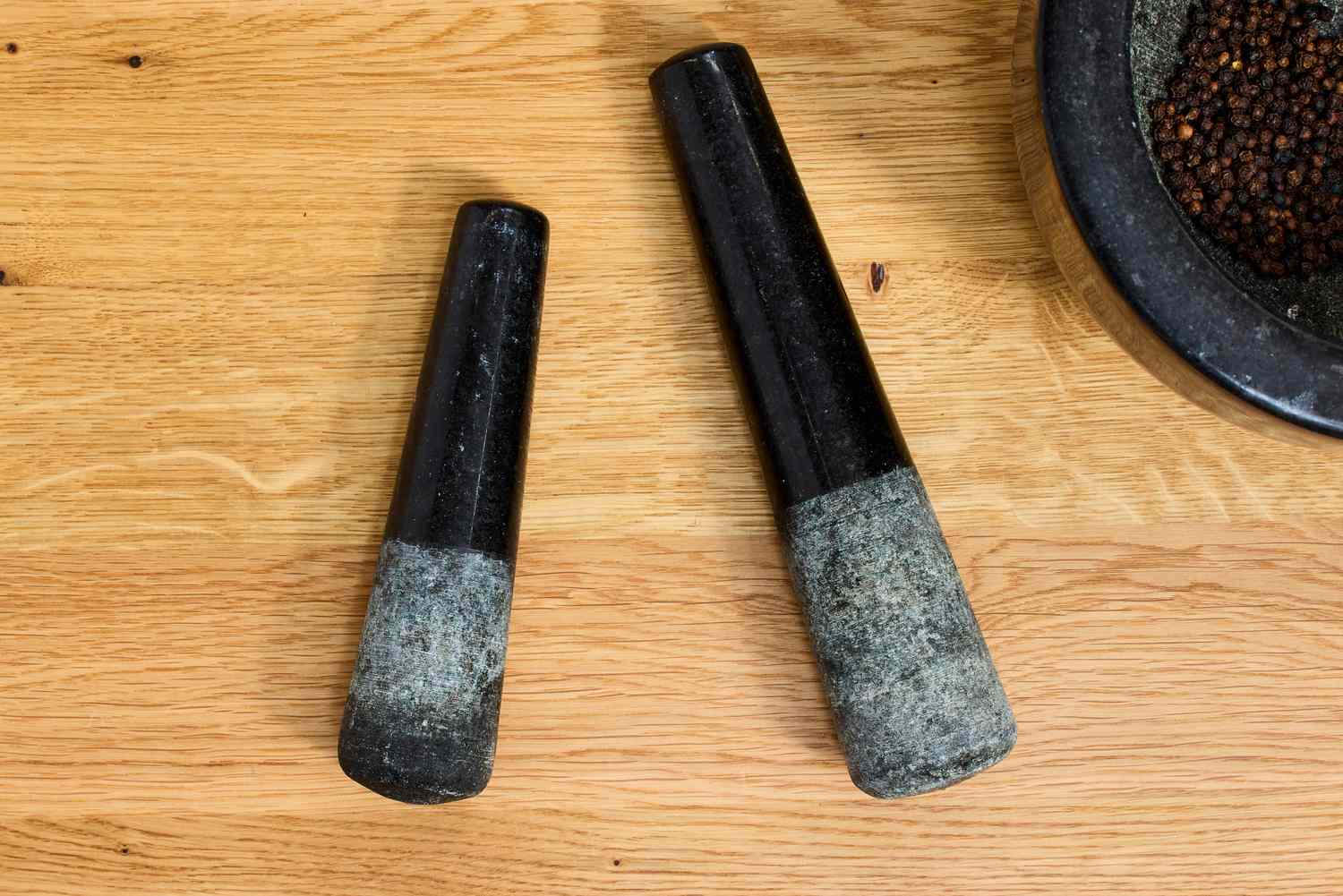 Two different sizes of pestles.