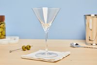Williams Sonoma Reserve Martini Glasses empty sitting on a napkin