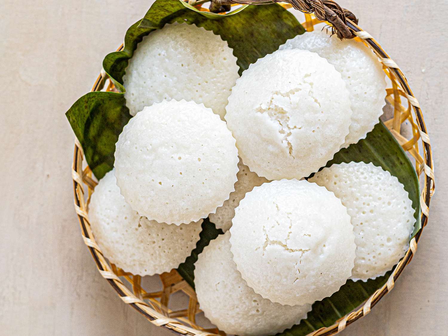 Overhead view of finished puto in a basket