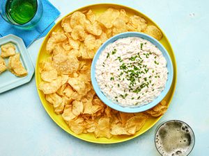 Overhead view of french onion dip surrounded by Chips