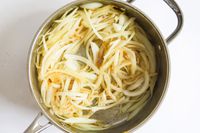 Food cooking in a pot from the Cuisinart Professional Series Cookware 11 Piece Set