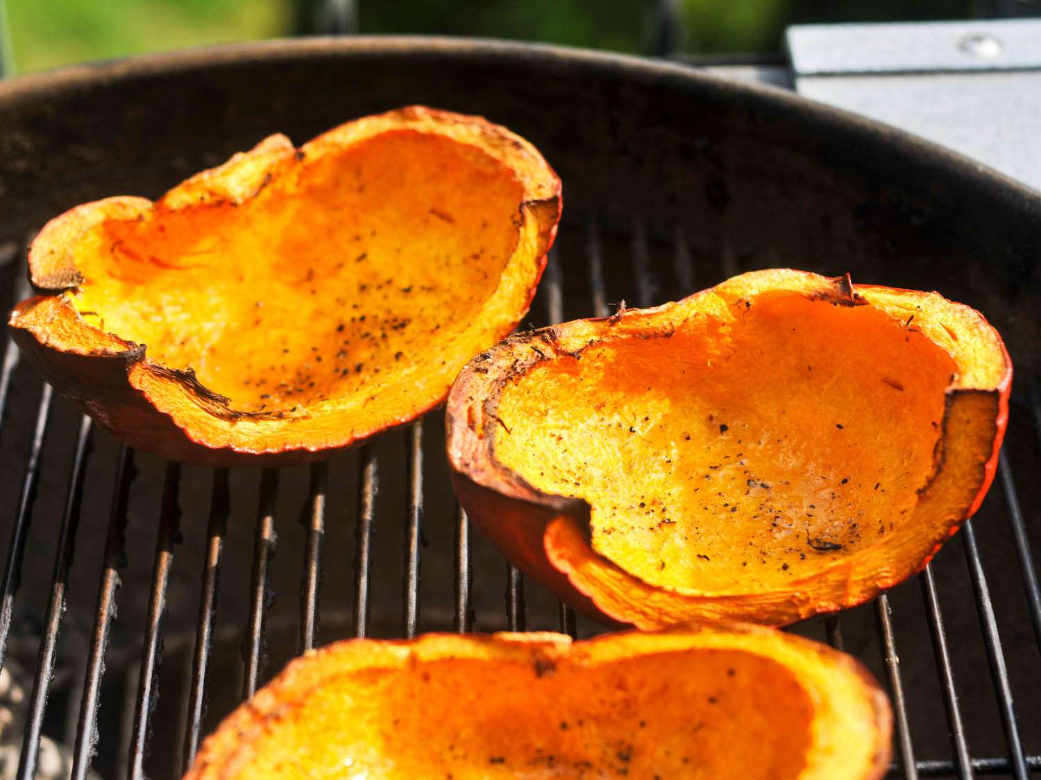 Pumpkin wedges being grilled 