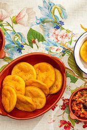 Overhead view of sopaipillas with pebre 